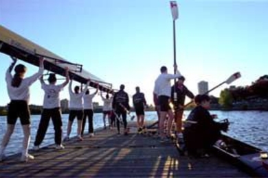 MIT crews head off in the gathering dusk to practice for last weekend's Head of the Charles Regatta.
