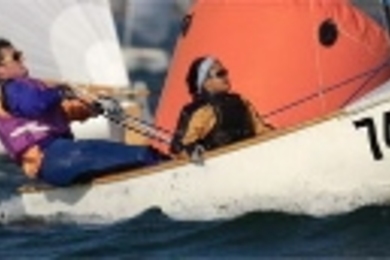 Mike Kalin and Ariya Dararutana sail the "Susan B" during the Interclub Dinghy Frostbite Nationals on Duxbury Bay.