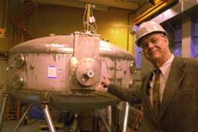 Miklos Porkolab, director of MIT's Plasma Science and Fusion Center, stands next to the center's Levitated Dipole Experiment. Porkolab discussed the future of fusion energy at the AAAS meeting held in Boston Feb. 14-19.
