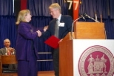 Beth Garvin receives her honorary membership to the Alumni Association from outgoing Alumni Association president L. Robert Johnson during Tech Day ceremonies