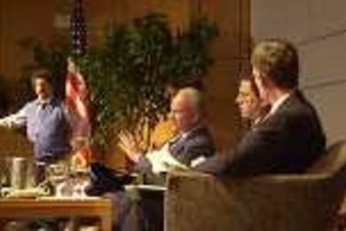 Offering their views of cybersecurity at last week's town hall meeting were (left to right) Jeff Schiller of MIT, national cybersecurity chief Richard Clarke, John Grossman and Gary Beach.