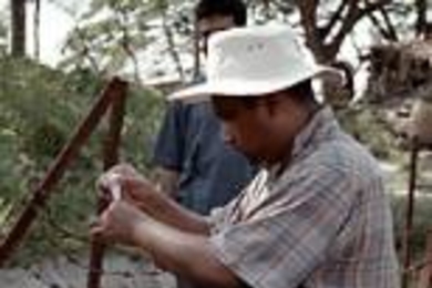 MIT graduate student Khandaker Nurul Ashfaque tests water chemistry in Bangladesh.