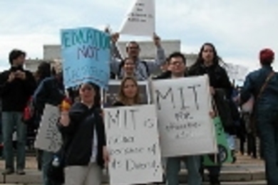 The MIT group followed the demonstration to the Mall in Washington, D.C. after arguments on the University of Michigan affirmative action case ended at the Supreme Court. Passing the message from the steps of the Lincoln Memorial are (foreground, left to right) junior Cassandra Rodriquez, senior Nancy Ramirez and Daniel Cabrera, (S.B. 2001).