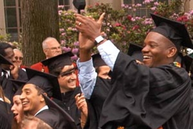 Members of the Class of 2003 cheer on one of their classmates during Commencement at MIT. <a onclick="MM_openBrWindow('01-comm-applause-enlarged.html','','width=509, height=583')"><span onmouseover="this.className='cursorChange';">Open image gallery</span></a><noscript> <a href="01-comm-applause-enlarged.html"><em>(no JavaScript)</em></a></noscript>
