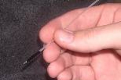 The Spectroscopy Lab developed a device that detects precancerous tissue by sequentially delivering laser light of 10 different colors to the tissue via an optical fiber probe. The probe, shown here, consists of a bundle of optical fibers with a diameter of just over 1mm, making it compatible with standard endoscopes. The returning light is collected using the same probe and analyzed with a spectr...