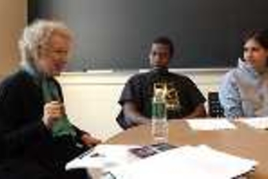 Margaret Atwood speaks with freshmen Linroy Marshall (center) and Tabitha Bonilla during a class visit.