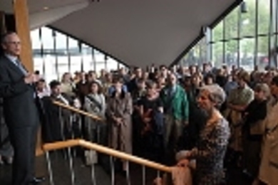 President Charles M. Vest addresses MIT community members at an informal version of the State of the Institute Forum on Monday afternoon. A power outage in Cambridge forced the planners to hold the event in Kresge lobby instead of inside the auditorium.