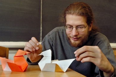 Erik Demaine, assistant professor of computer science, folds the tail of a duck form during the beginner's origami workshop offered by visiting artist Robert Lang on Nov. 13. Lang was on campus to work with Demaine on an algorithm for origami.