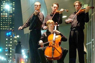 The Calder Quartet, shown posing on a Los Angeles sidewalk, will perform at MIT on Feb. 25.