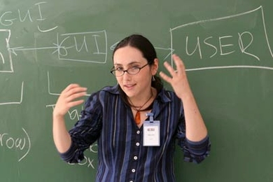 Maria 'Masha' Kamenetska, an MIT undergraduate, instructs participants in the Middle East Education Through Technology program earlier this summer. The program brings Israeli and Palestinian high school students together to learn computer science, entrepreneurship and leadership skills.