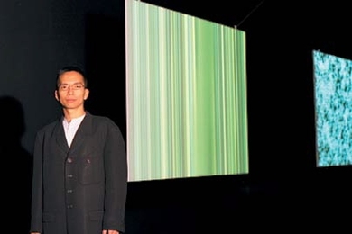 MIT Associate Professor John Maeda stands alongside stills from his 'Nature' series at the Fondation Cartier Pour l'Art Contemporain in Paris. <a onclick="MM_openBrWindow('maeda-portrait-enlarged.html','','width=509, height=583')">
<span onmouseover="this.className='cursorChange';">Open image gallery</span>
</a>
<noscript> <a href="maeda-portrait-enlarged.html">
<em>(no JavaScript)</em>
</a>...