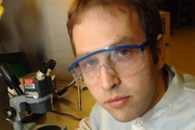 MIT Assistant Professor Karl Berggren of electrical engineering and computer science works on nanowires in the lab.