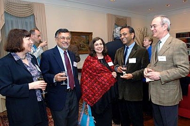 Newly tenured faculty members were feted at Gray House on Tuesday, May 16. From left are Elly Nedivi of brain and cognitive sciences (BCS), who received tenure; Mriganka Sur, head of BCS; Pamela Lipson (S.M. 1993, Ph.D. 1996); her husband, Pawan Sinha, who received tenure; and L. Rafael Reif, provost.