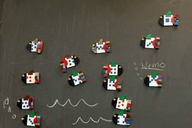 High school girls visiting MIT for the You Go Girl! program learned about genetics using fish built of Legos. After learning about meiosis and mitosis, sperm and eggs, the girls made their own generations of fish, discovering something about phenotypes and recessive and dominant genes along the way.