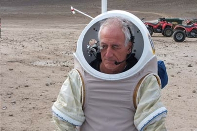 MIT Professor Jeffrey Hoffman tests a spacesuit on Mars-like terrain in the Arctic in 2005.