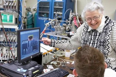Professor Mildred Dresselhaus received a 2007 L'Oreal-UNESCO Award for Women in Science for her research on carbon nanotubes, images of which she points to on a monitor.