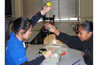 Jenny Ruan '07, left, works with eighth-grader Sabrine Sousa as part of the Public Service Center's SciPro program, which matches MIT students with teenagers in Boston and Cambridge to work on science projects.  <a onclick="MM_openBrWindow('awards-psc-enlarged.html','','width=509, height=583')">
<span onmouseover="this.className='cursorChange';">Open image gallery</span>
</a>
<noscript> <a href...