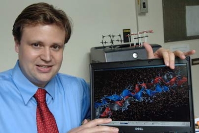 MIT Professor Markus Buehler has helped reveal why bones are so tough.  The object on the screen is a triple helical tropocollagen molecule, a fundamental building block of bone. Next to the molecule are nanosized hydroxyapatite chalk-like crystals. In his work he simulates the behavior of the composite of tropocollagen and hydroxyapatite during deformation.