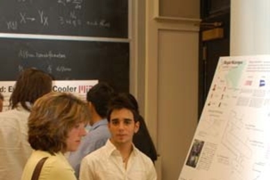 Sophomore Xavier Gonzalez, right, shows his team's poster to judge Cora Leibig, an MIT alum who works at Dow Chemical. Gonzalez' team, Biogas Nicaragua, finished second in the MADMEC contest, held Sept. 25, 2007. <a onclick="MM_openBrWindow('madmec-1-enlarged.html','','width=509, height=583')">
<span onmouseover="this.className='cursorChange';">Open image gallery</span>
</a>
<noscript> <a href=...