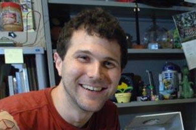 Mechanical engineering graduate student Barry Kudrowitz, who teaches a toy product design course at MIT, began his design life building an Epcot theme park out of LEGOs. Here he is shown with some of his more
recent creations.