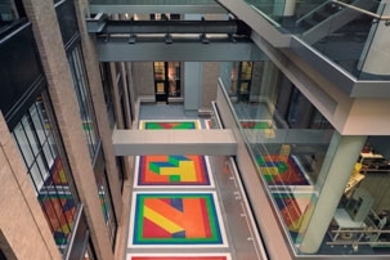 Sol LeWitt's 'Bars of Color within Squares,' located in the Green Center for Physics, with Building 6C to the right.