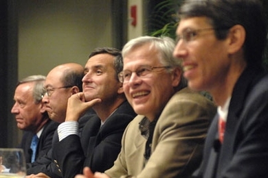 A panel of MIT faculty experts convened Oct. 7 to discuss current economic news. From left are William Wheaton, director of the Center for Real Estate; Andrew Lo, Harris and Harris Group Professor, Sloan School of Management; Ricardo Caballero, head, MIT Department of Economics; Bengt Holmstrom, Paul A. Samuelson Professor of Economics, and James Poterba, Mitsui Professor of Economics.