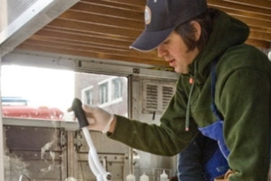 Ayr Muir '00, SM '01 at his food truck, the Clover Food Lab, which is the newest addition to MIT's food truck population on Carleton Street. The Clover Food Lab is an all-vegetarian, eco-friendly mobile eatery.