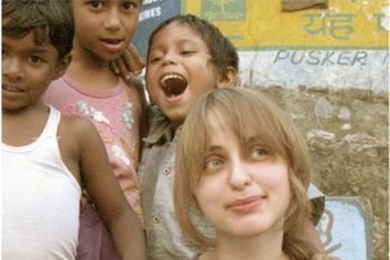 Anna Kotova with kids they came across in a recent visit to some villages in India.