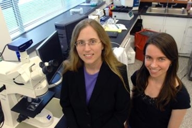 Carol Livermore, associate professor of mechanical engineering, left, stands with graduate student Frances Hill in Livermore's lab.