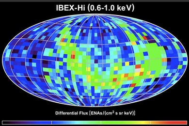 The IBEX satellite maps the boundary layer of the sun's bubble, or heliosheath. This map shows this data plotted on an all-sky image, revealing the bright ribbon-like structure (in greens, yellows and reds) swirling across the sky. 