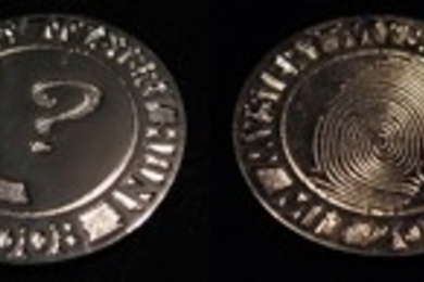 The 2008 Mystery Hunt Coin featured the thumbprint of Dr. Awkward's murderer, whom hunters had to identify.