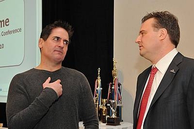 Dallas Mavericks owner Mark Cuban, left, speaks with Houston Rockets General manager Daryl Morey MBA '00, right, during the MIT Sloan Sports Analytics Conference.