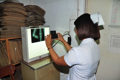 A nurse in the Batanes Provincial Hospital uses Moca to upload a patient's X-ray as a
teleradiology case.
