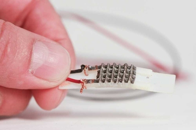 The researchers developed their new actuators as part of a project to build “printable robots,” whose plastic components, like the one shown here, could be built in layers by machines that resemble ink jet printers. The metal actuator, fastened to the top of the plastic joint, is a fraction of a millimeter thick.