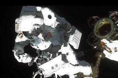 Astronaut and MIT alumnus Robert L. Satcher Jr. '86, PhD '93, STS-129 mission specialist, participates in a spacewalk. 