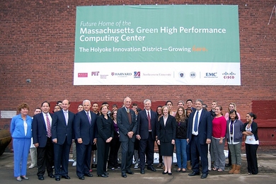 Leaders from government, academia and industry attend a groundbreaking ceremony on Tuesday, Oct. 5, in Holyoke, Mass., for the Massachusetts Green High Performance Computing Center.