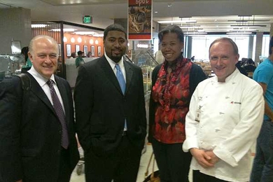 From left, MIT Dean for Student Life Chris Colombo, Aramark Resident District Manager Ronald Guillory, MIT senior Christina Johnson and Aramark Executive Chef Michael Gueiss tour the Johns Hopkins University dining hall in Baltimore.