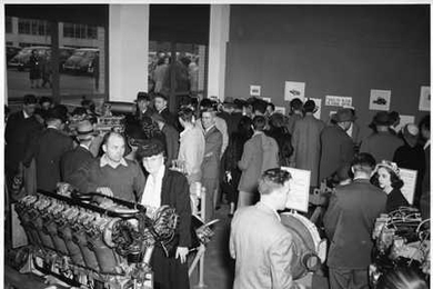 During the 1948 MIT Open House, visitors examine engines.