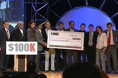 Members of sanitation start-up 'Sanergy' accepts the $100,000 prize as winners of the MIT $100K competition 100K associate director John Casey (far left), managing director Kourosh Kaghazian (far right), and venture capitalist Vinod Khosla (second from left) presented the team with the check. 