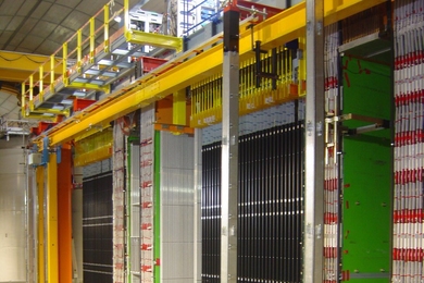 View of the OPERA detector (on the CNGS facility) with its two identical Super Modules, each one containing one target section and one spectrometer