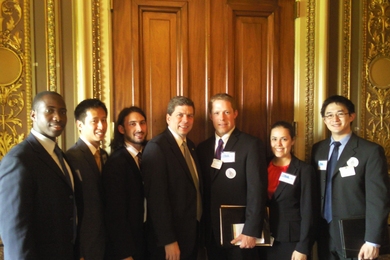 From left, Richard Agbeyibor, Patrick Wen, Daniel Rothenberg, U.S. Sen. Mark Begich (D-Alaska), Dillon Gardner, Eleanor Bors and Michael Chang.