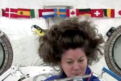 Commander Cady Coleman '83, astronaut and accomplished flautist; International Space Station