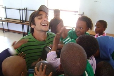 Sebastian Modak with students in Africa.