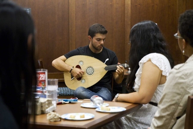 Stephanos Karavas, a student at Tufts University, put on a performance featuring the oud, a traditional Arabic instrument.