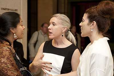 Jennifer Recklet Tassi (right), program manager for MIT Spouses & Partners, introduces group member Sukanya Swetharanyan (left) to Dean for Graduate Education Christine Ortiz.