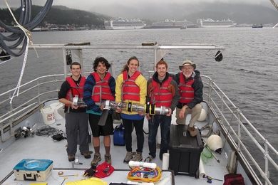 From left to right, Adrian Tanner, David Wise, Jacqueline Sly, Tommy Moriarty and Ed Moriarty (Tommy’s father) hold their underwater glider on the Jack Cotant boat in Ketchikan, Alaska.
