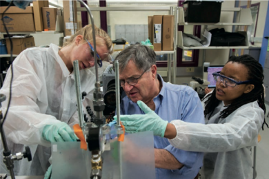 In their class project, Tshiamo Lechina ’13 (right) and Melissa Showers ’13 worked with Professor of Chemical Engineering Clark Colton to develop flow visualization techniques that will permit analysis of fluid dynamics in a process to create new materials for more energy-efficient tires.