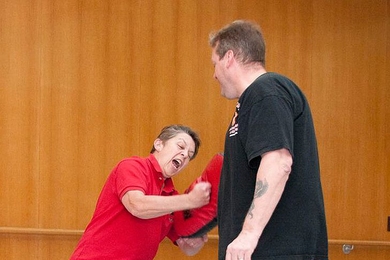 MIT Police Sergeant Cheryl Vossmer and Detective Willard Boulter demonstrate various strikes and stances during the RAD course.