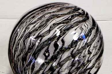 Artist Helen Lee embedded pangrams in this globe produced at the MIT Glass Lab.