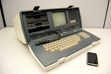 A recent iPhone, right, has thousands of times more computing power than an Osborne Executive "portable" computer from 1982. Such an improvement is an example of Moore's Law in action.